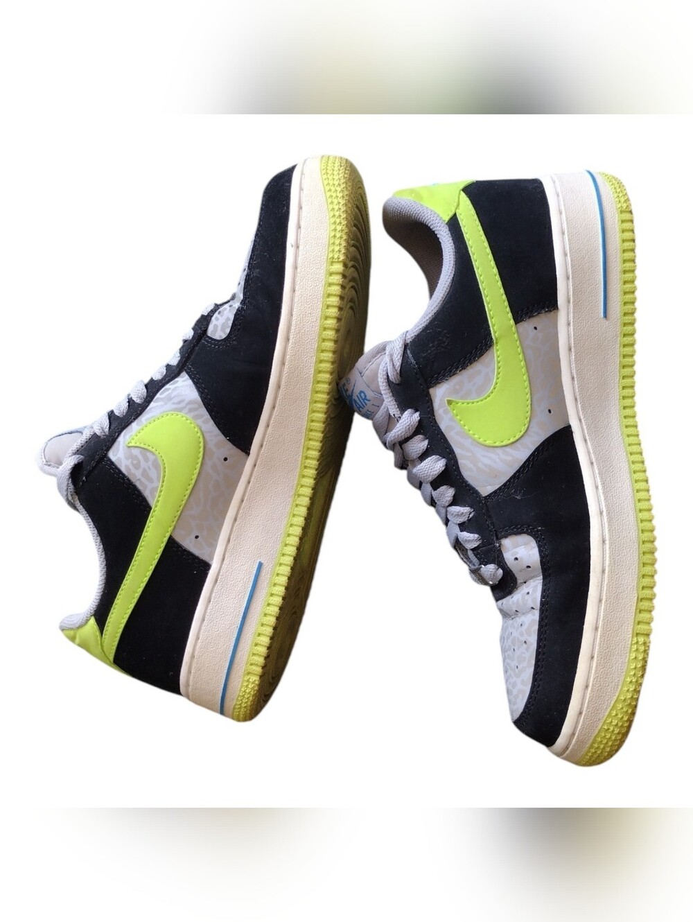 Nike Low-Top Sneakers in a Reflective Silver/Volt-Black colorway
